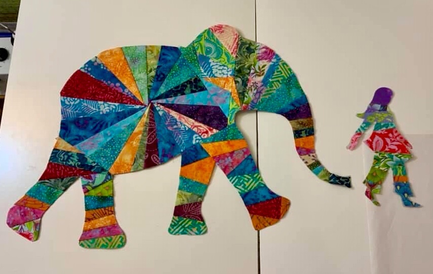 May be an image of elephant and food